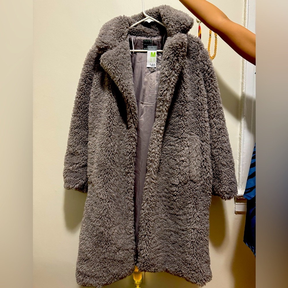 A furry coat by Primark. Brand new
